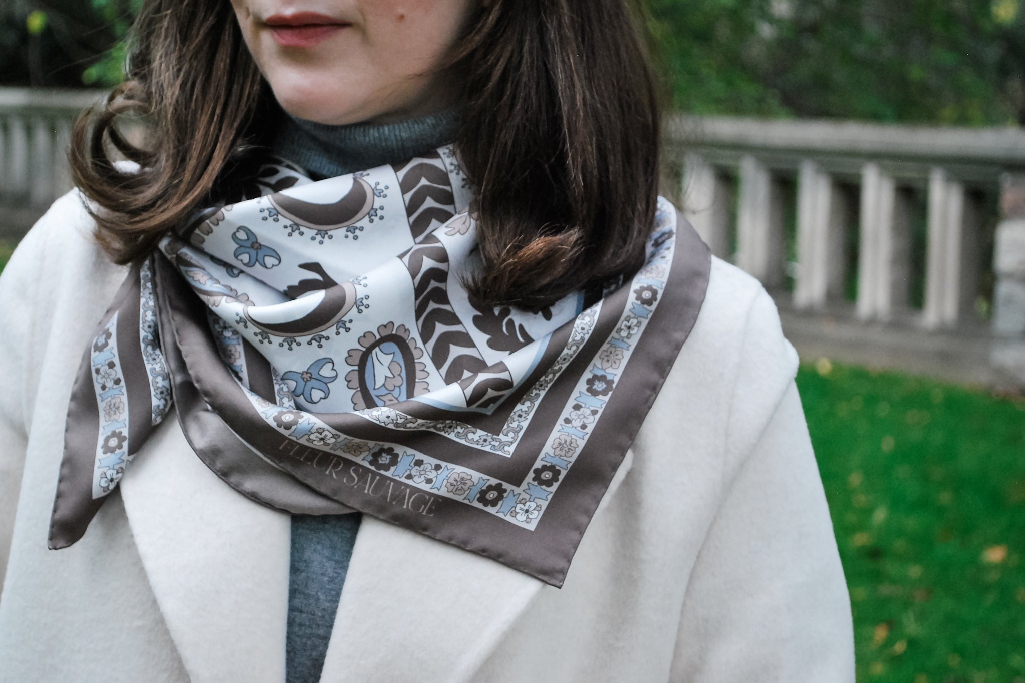 Maria Confer wearing a Fleur Sauvage Taupe Chateau silk scarf